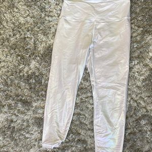 Unicorn white leggings with shimmer rainbow finish. Used no tears or stains.